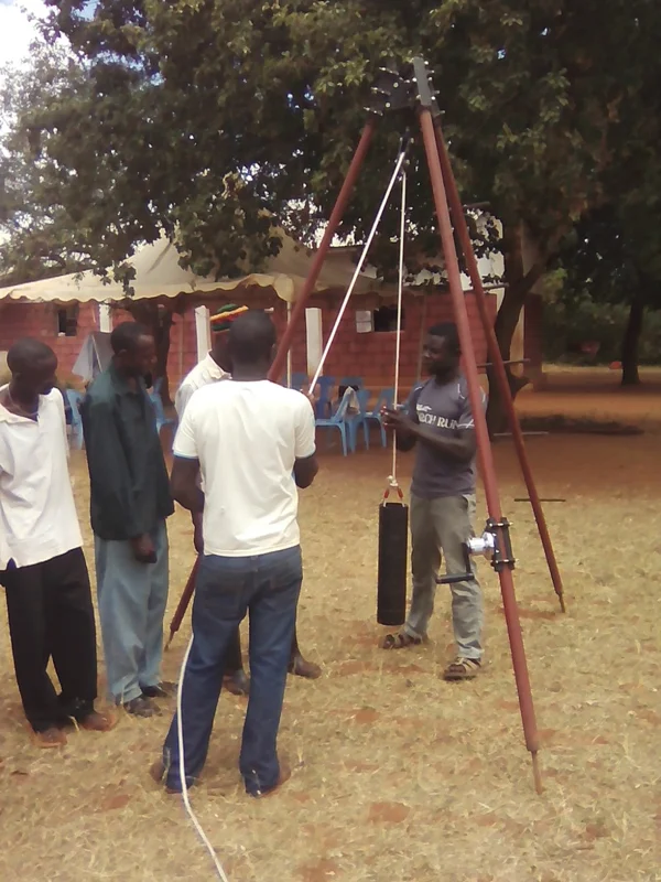 Wali Explaining on how to tie the plunger.jpg