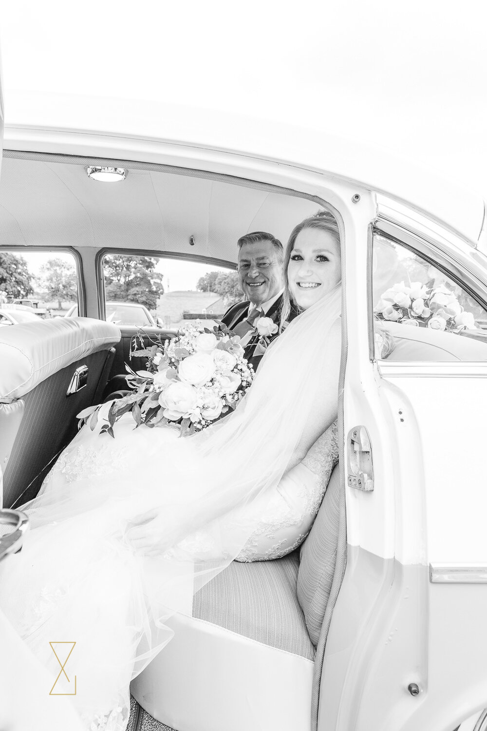 Bride-and-father-in-wedding-car-Cheshire