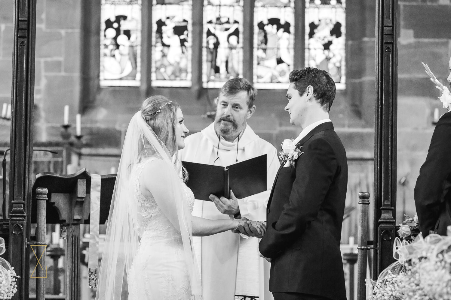 Bride-and-groom-exchange-vows-Cheshire-wedding