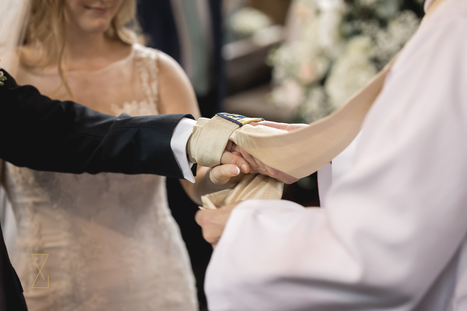 Vicar-handfasting-bride-and-groom-Gawsworth