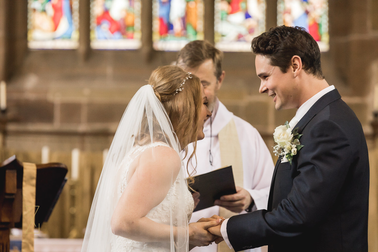 Wedding-ceremony-exchange-of-rings-Gawsworth-church