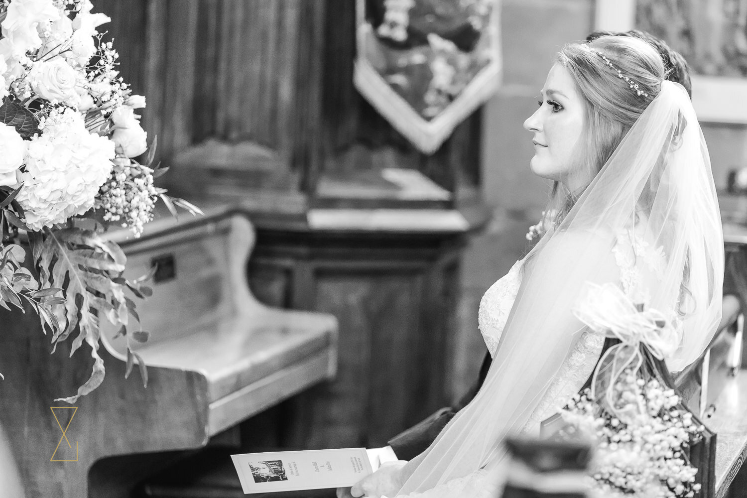 Bride-listening-to-wedding-reading-Cheshire-wedding