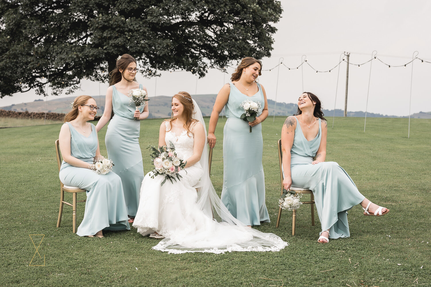 Bride-and-bridesmaids-group-photo-Heaton-House-Farm
