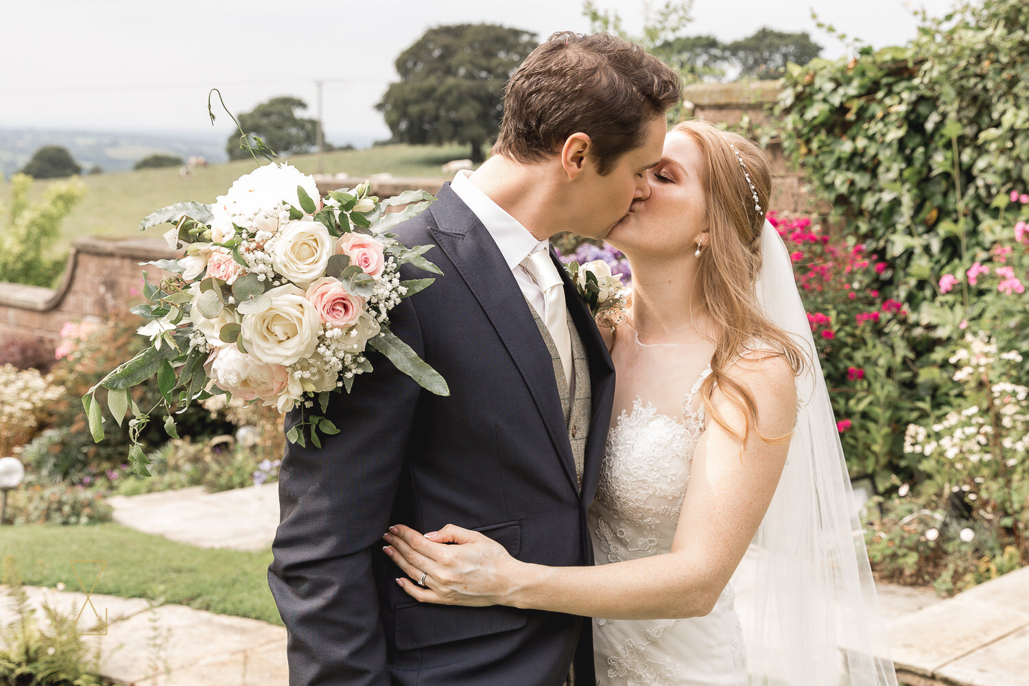 Bride-and-groom-in-gardens-Heaton-House-Farm