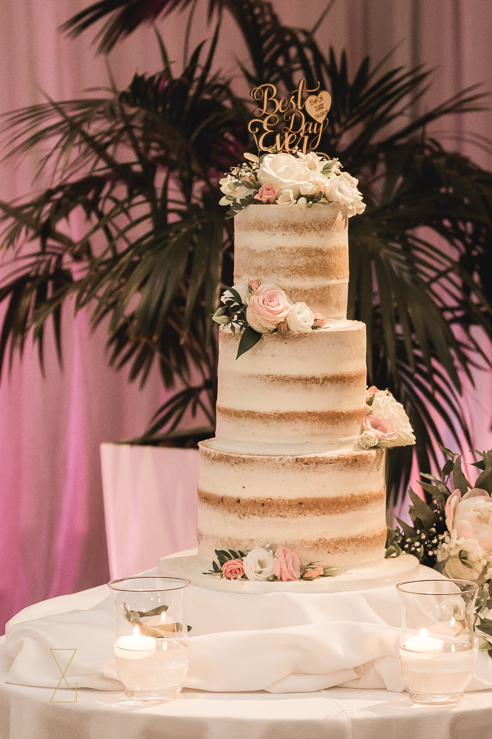 Three-tier-naked-wedding-cake-Heaton-House-Farm-wedding
