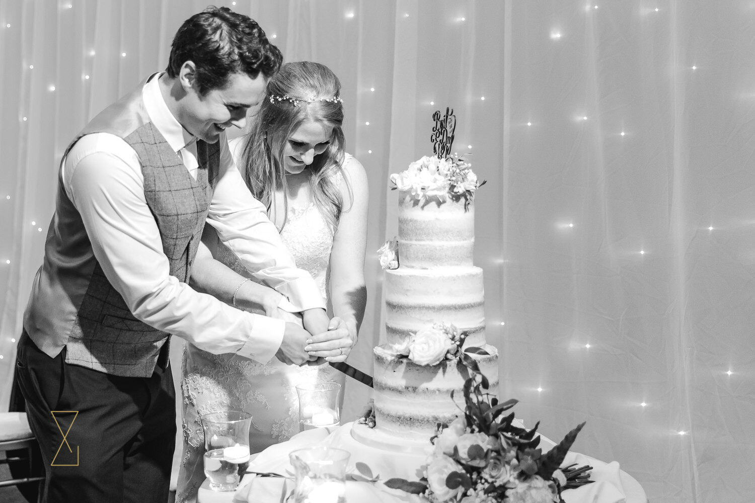 Bride-and-groom-cutting-cake-Cheshire-wedding