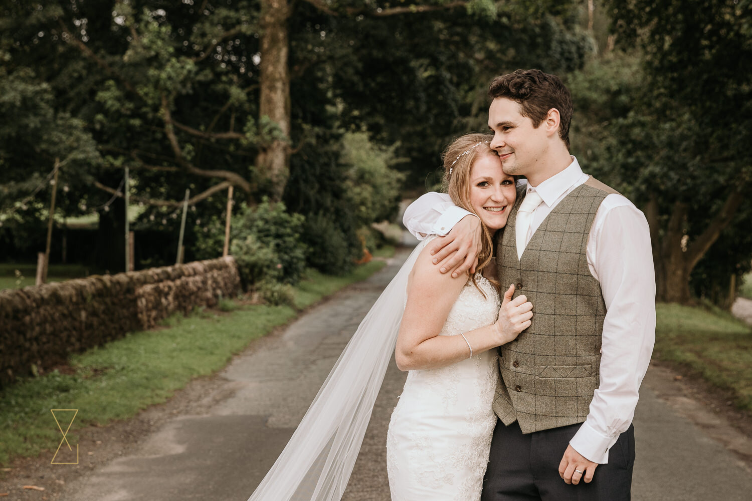 Bride-and-groom-in-the-country-barn-wedding-Heaton-House