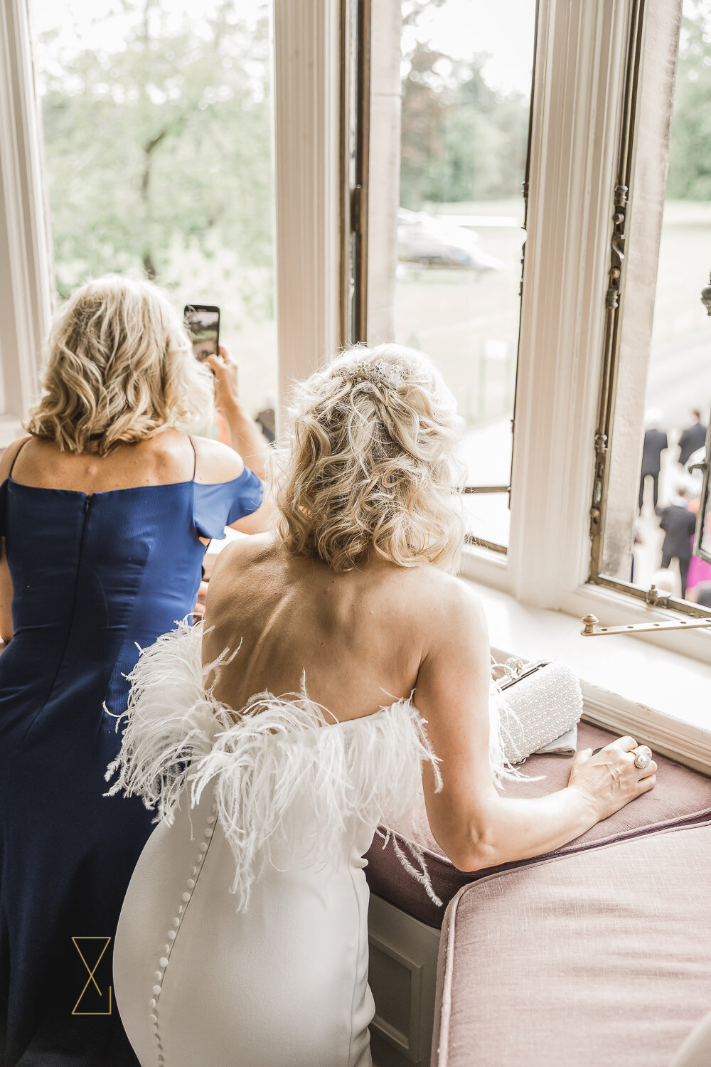 Watching-the-wedding-helicopter-land-at-Rookery-Hall