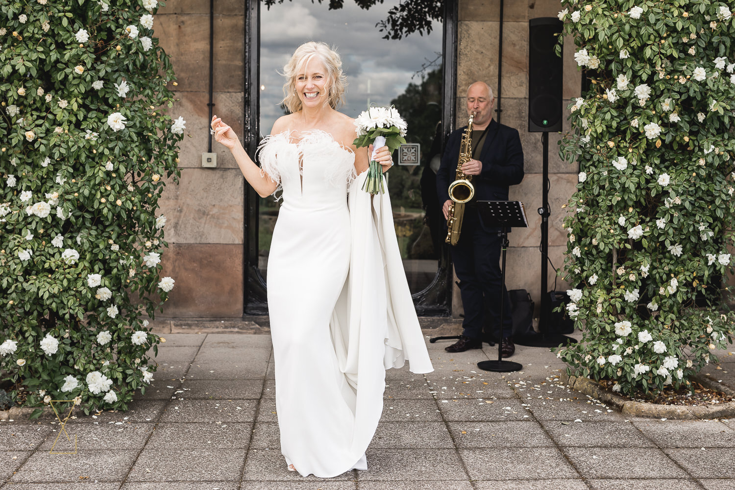 Stylish-bride-dancing-wedding-day-Rookery-Hall