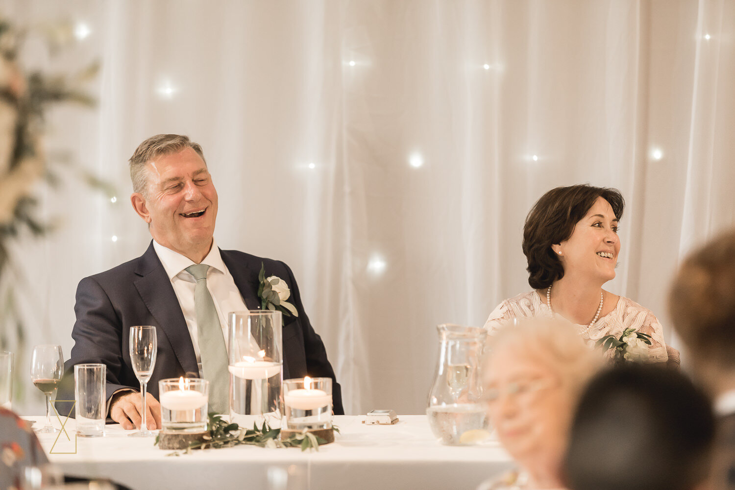 Father-of-the-bride-laughs-at-speech