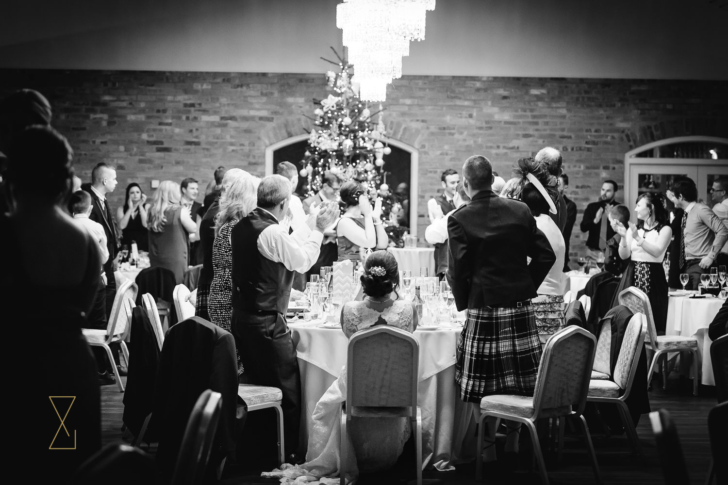 Guests-stand-and-clap-best-man-speech-Cheshire-wedding