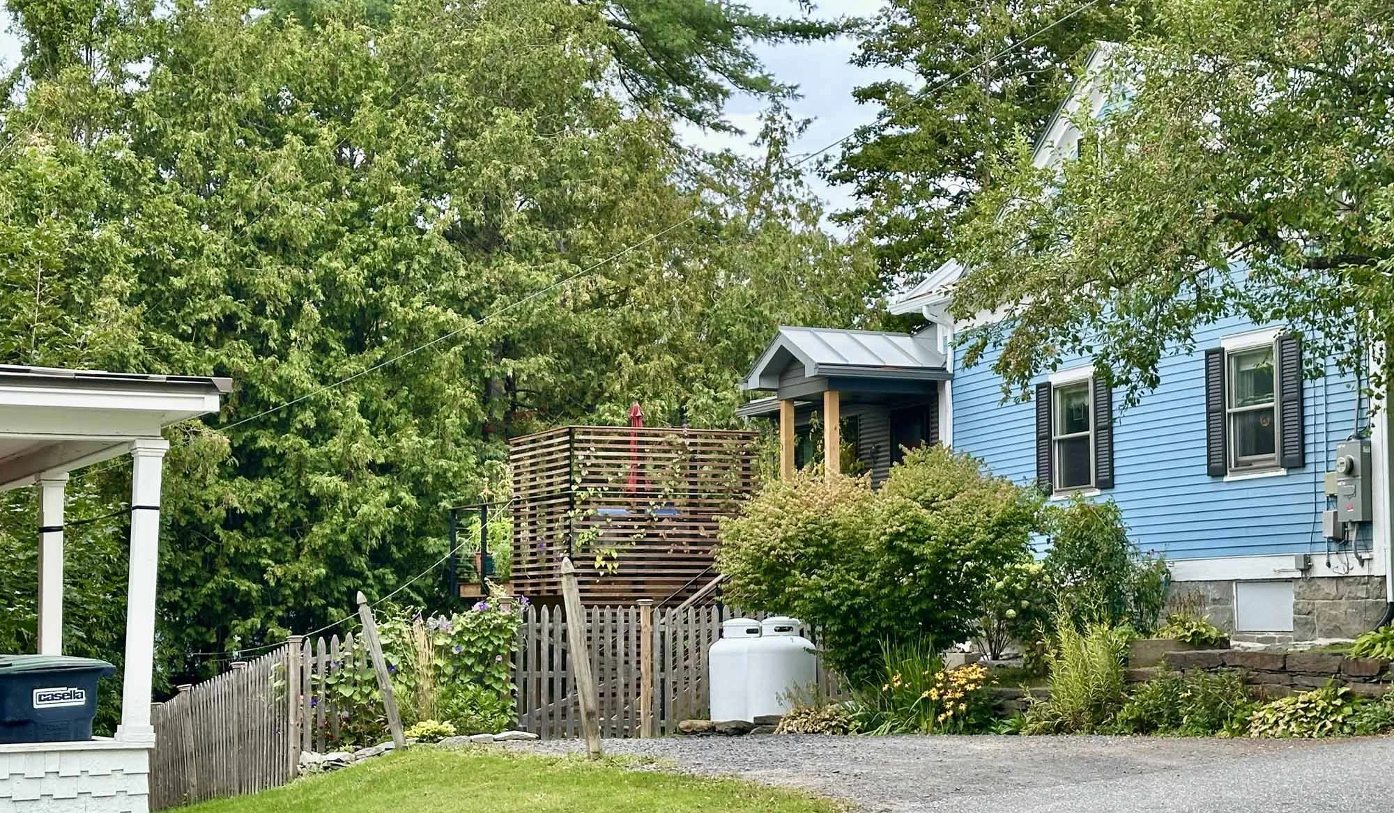 View rear Arocordis Design addition and new side deck and entry porch.
