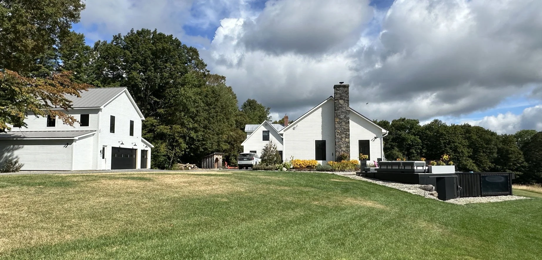 New flex barn, garage and living space on the left completes the home campus feel.