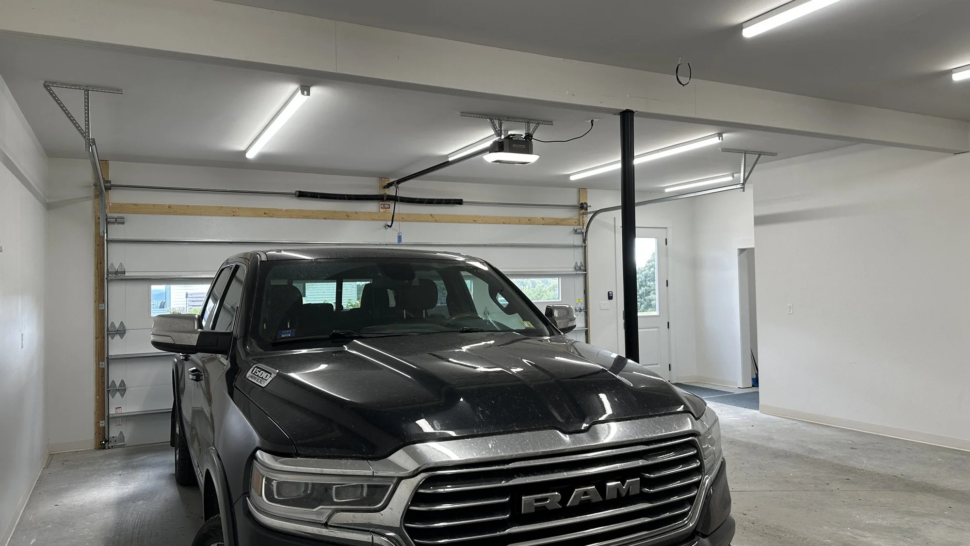 New garage area on the main level. 20 foot wide garage door.