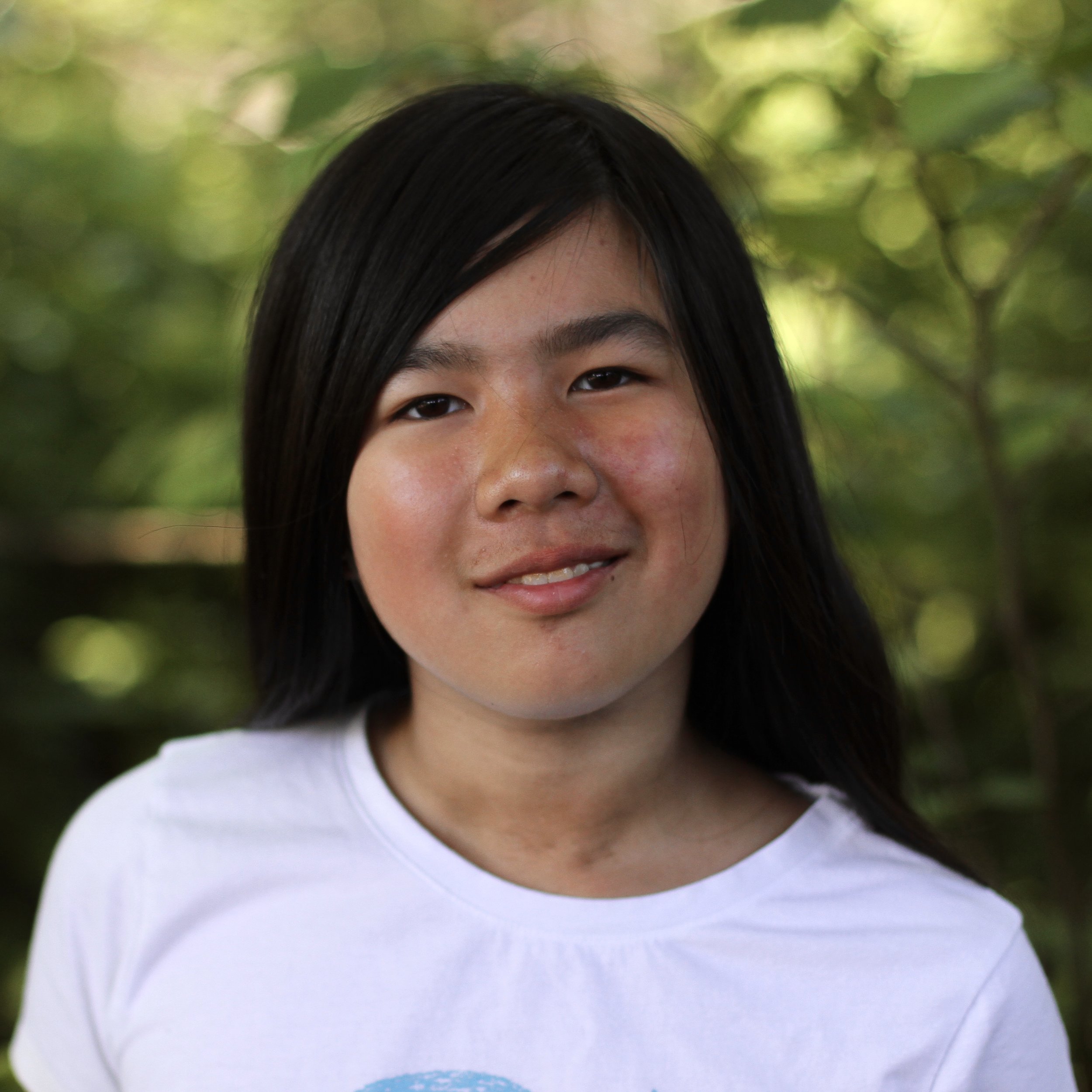 Smiling student with long black hair