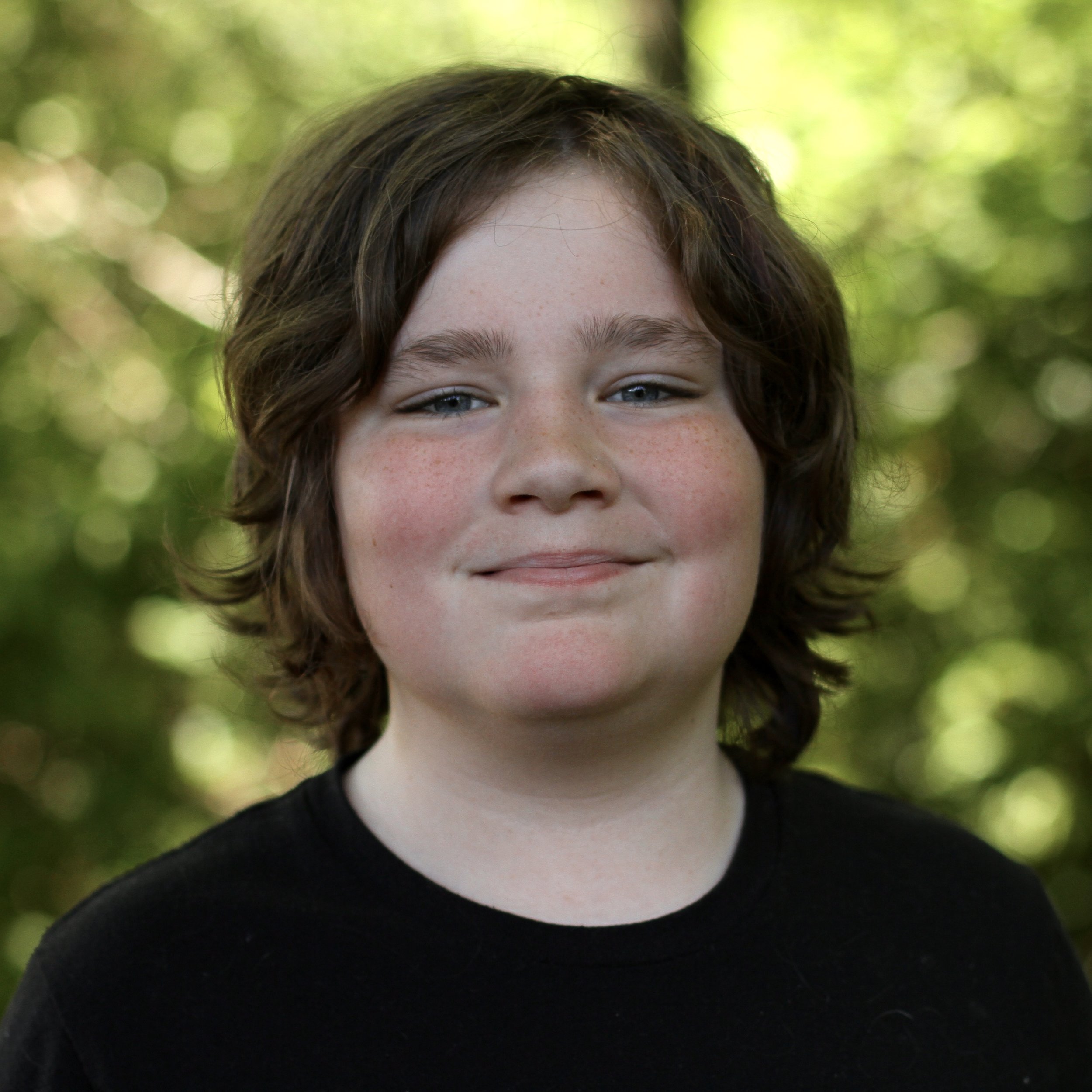 Smiling student with medium brown hair