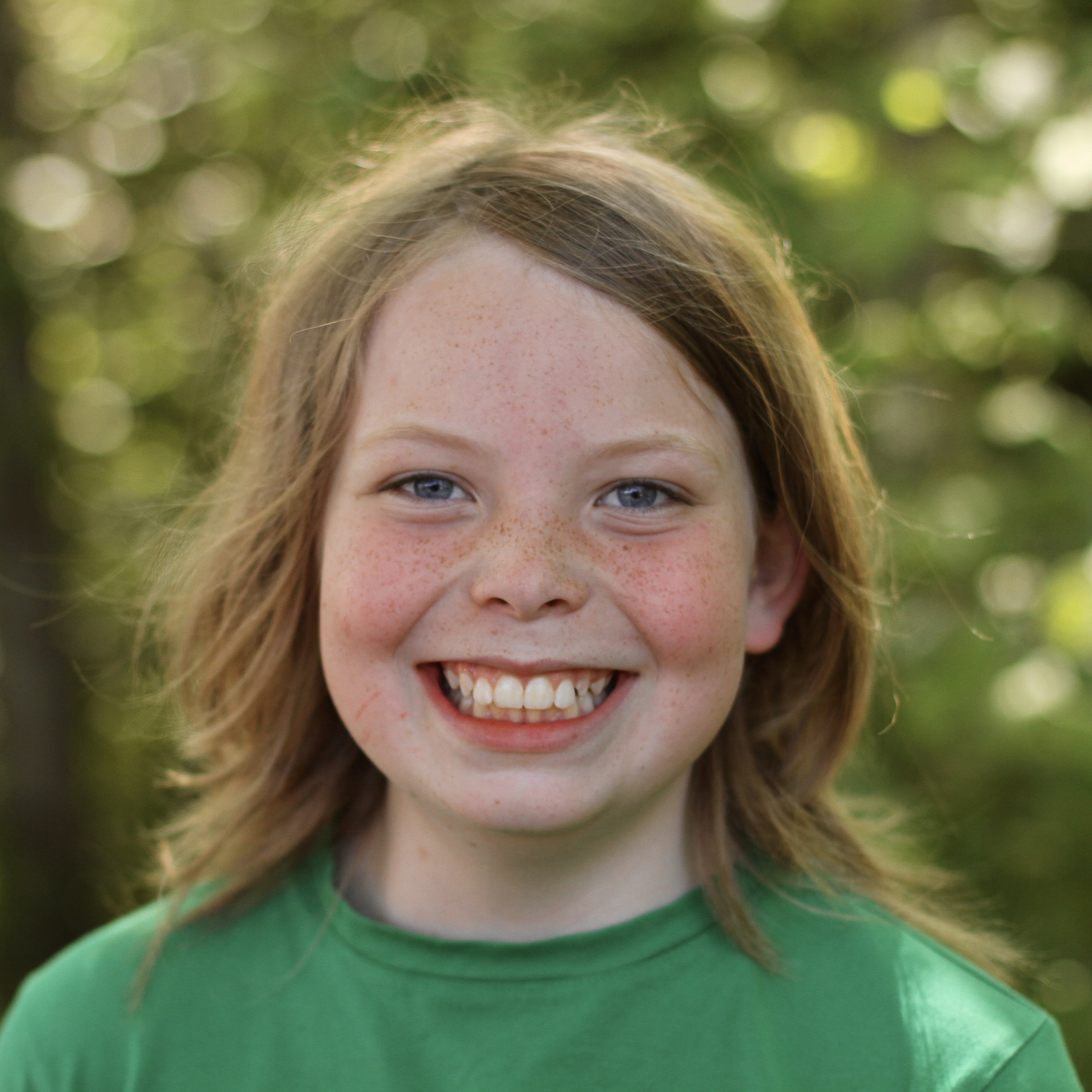 Smiling student with medium blond hair