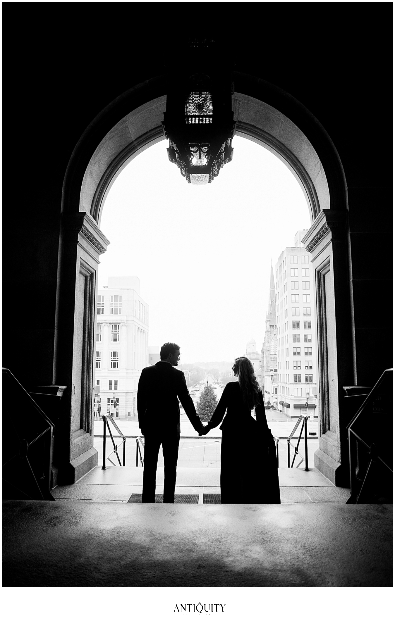  a young couple strolling in front of the capitol building in harrisburg 