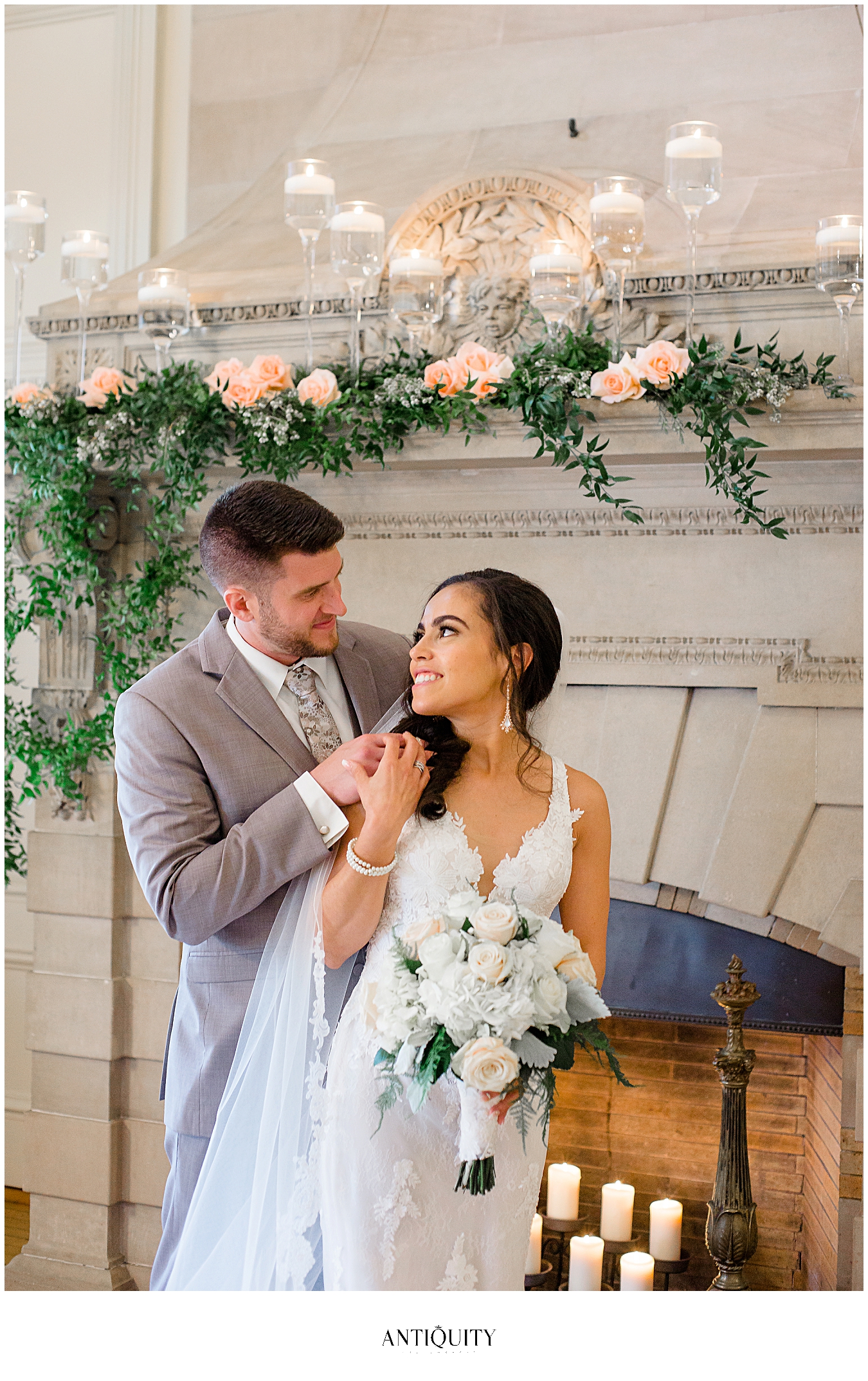  bride and groom at fireplace at cairnwood estate 