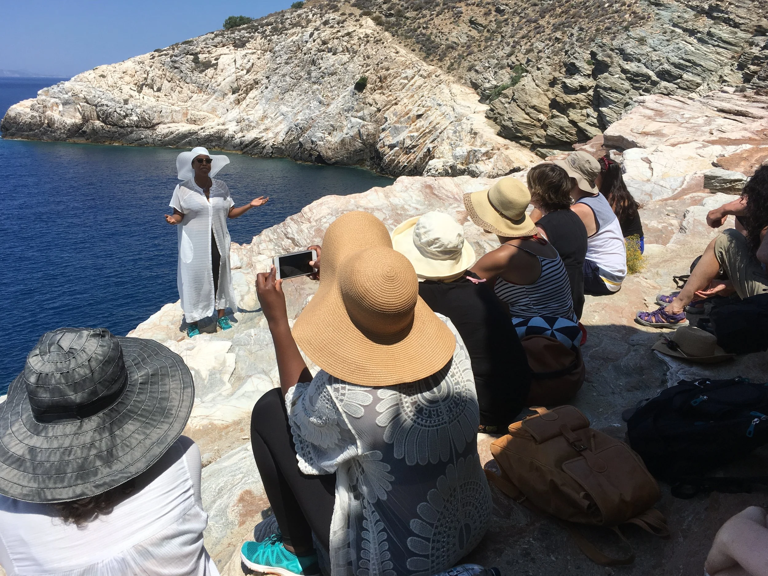 Students perform at beautiful Livadaki Bay on our final day of the workshop