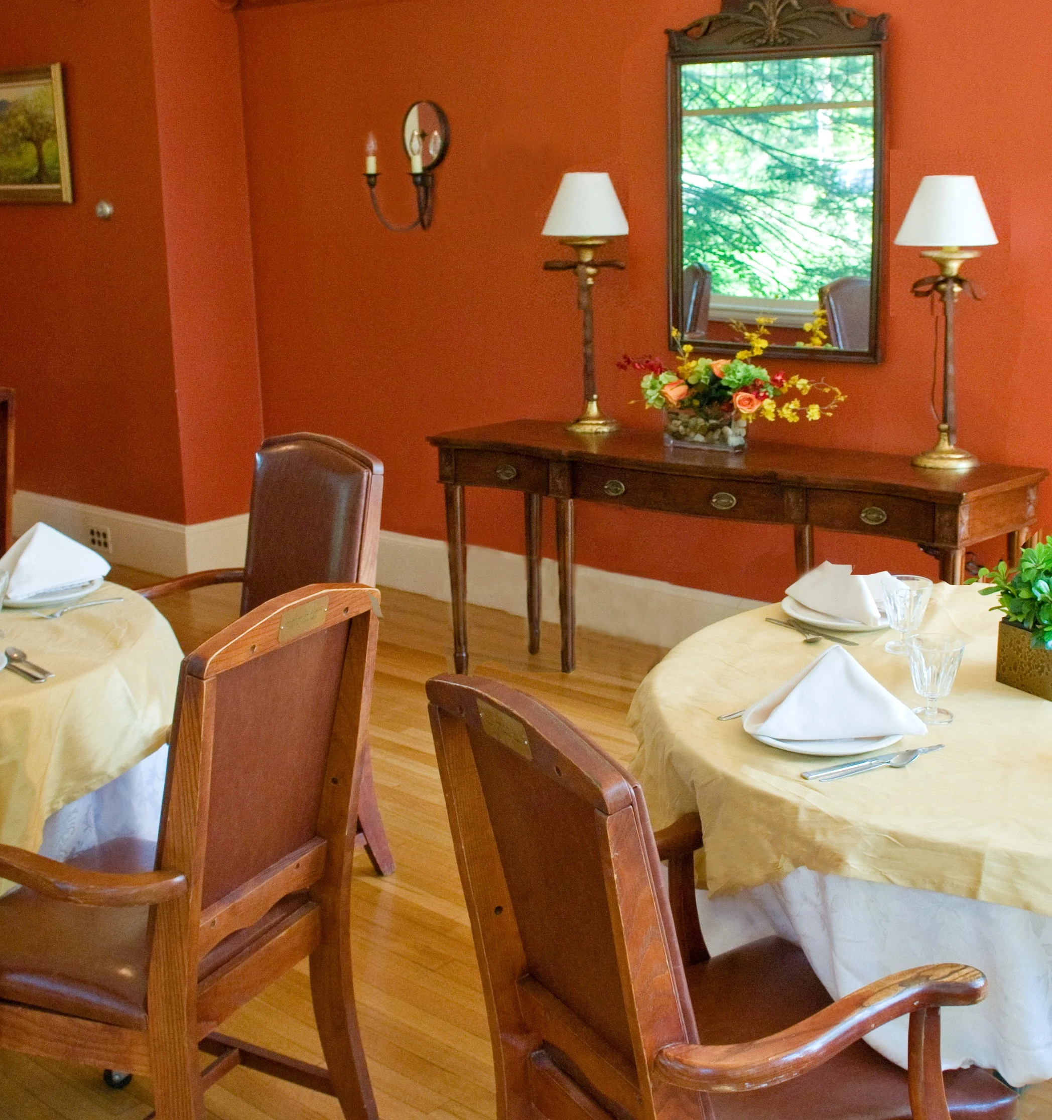 Red tones in a dining room stimulate the appetite as well as conversation.