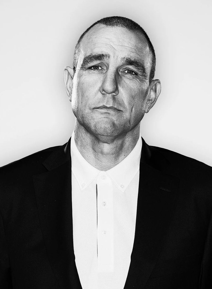Guy Ritchie’s ‘Viva La Madness’ Casts Vinnie Jones, Jason Isaacs, Babs Olusanmokun &amp; Camila Mendes Among 7