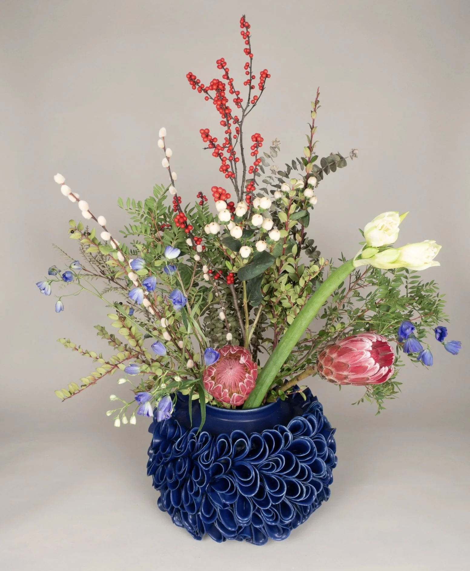 Blue Vase with Flowert arrangements .jpg