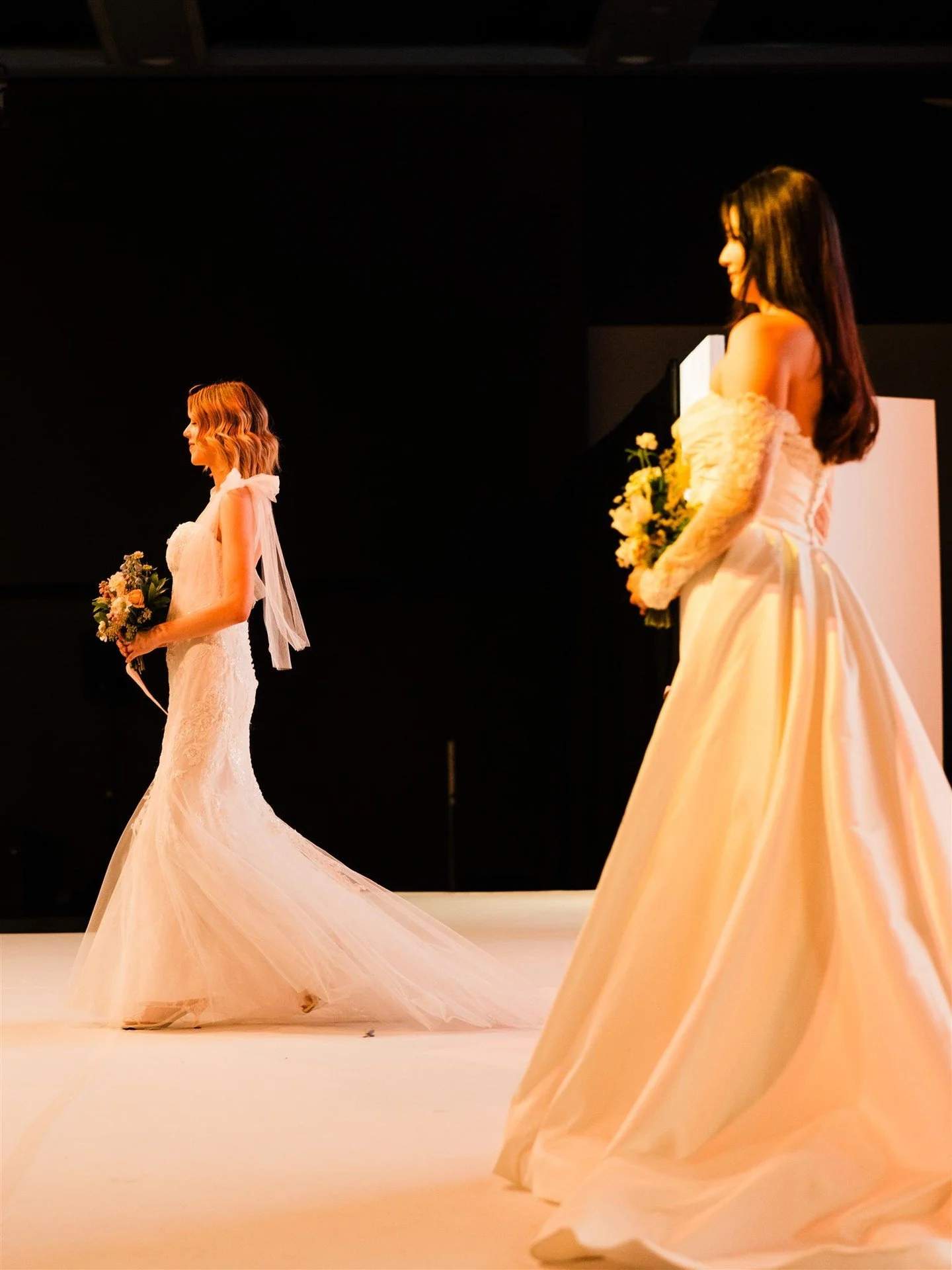 The sweetest detail&mdash;this bow accent on the shoulder is giving us all the dreamy, romantic vibes. ✨ 

Want to see how these gowns move down the runway? Don&rsquo;t miss our 2026 fashion shows at the Seattle Wedding Show.

🗓️ January 31 &amp; Fe