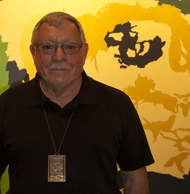 Bob Riseling in front of "Palmetto" acrylic on canvas (one of his many Horn Island paintings)