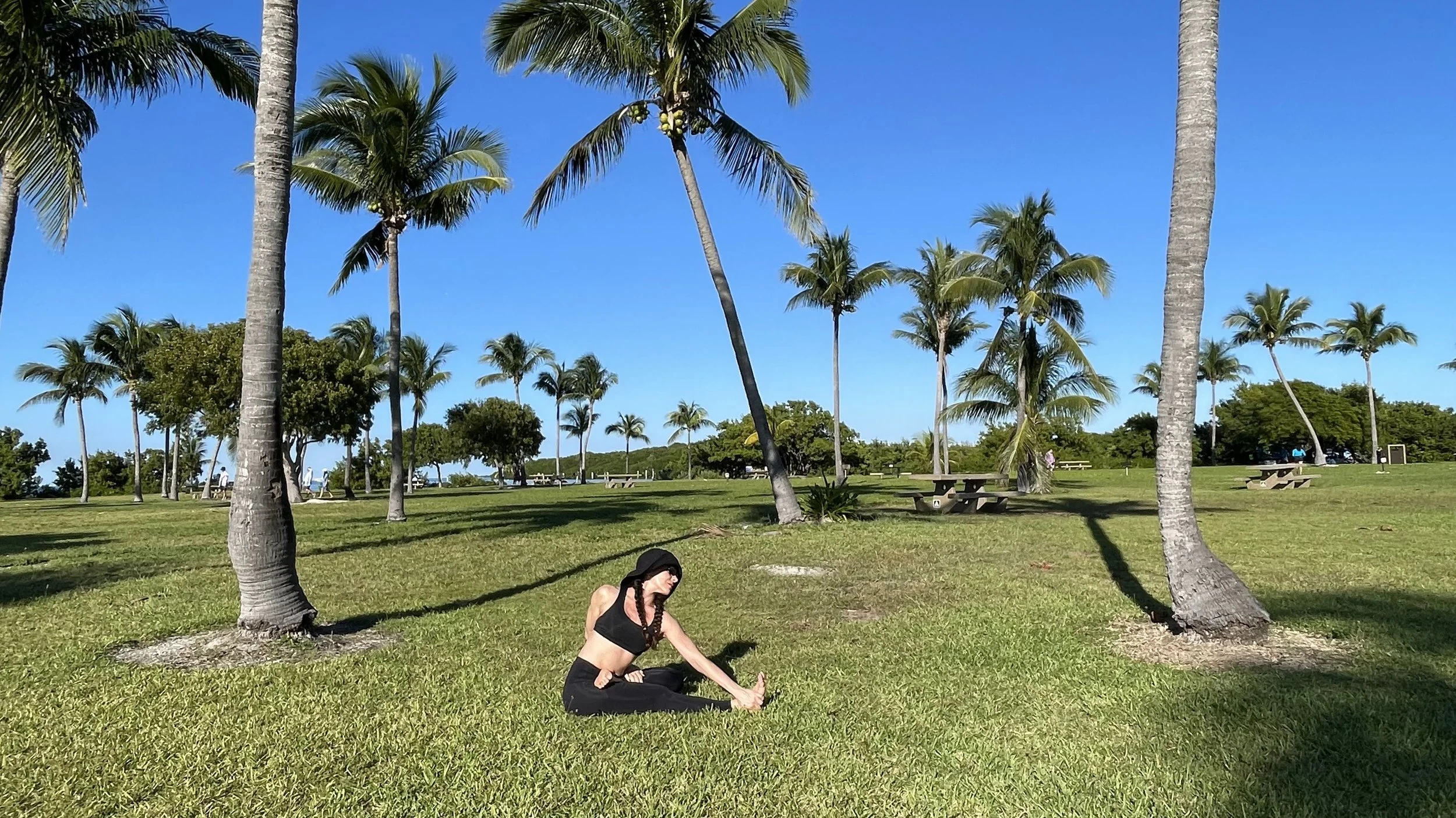 Neev_sitting_palm_trees_Boca_Chita.jpeg
