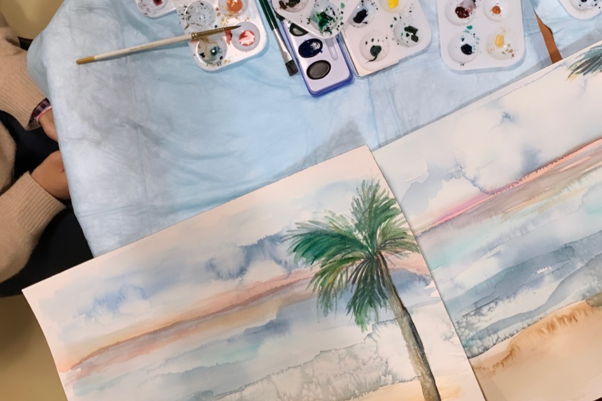 Artist Amanda Hawthorne, of Live Well Paint Often, creates water color painting with patient at NYC Hospital.