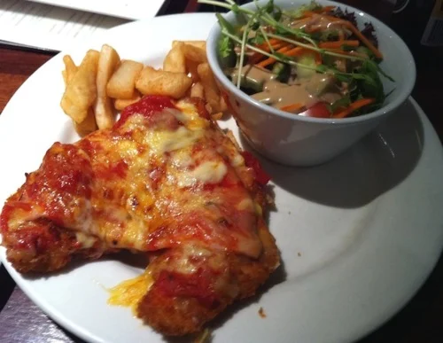Gladstone Park Hotel parma 2011. Apart from being small & messily presented it wasn’t terrible . Real chicken breast at the very least! Final score of 6.03 at the time.