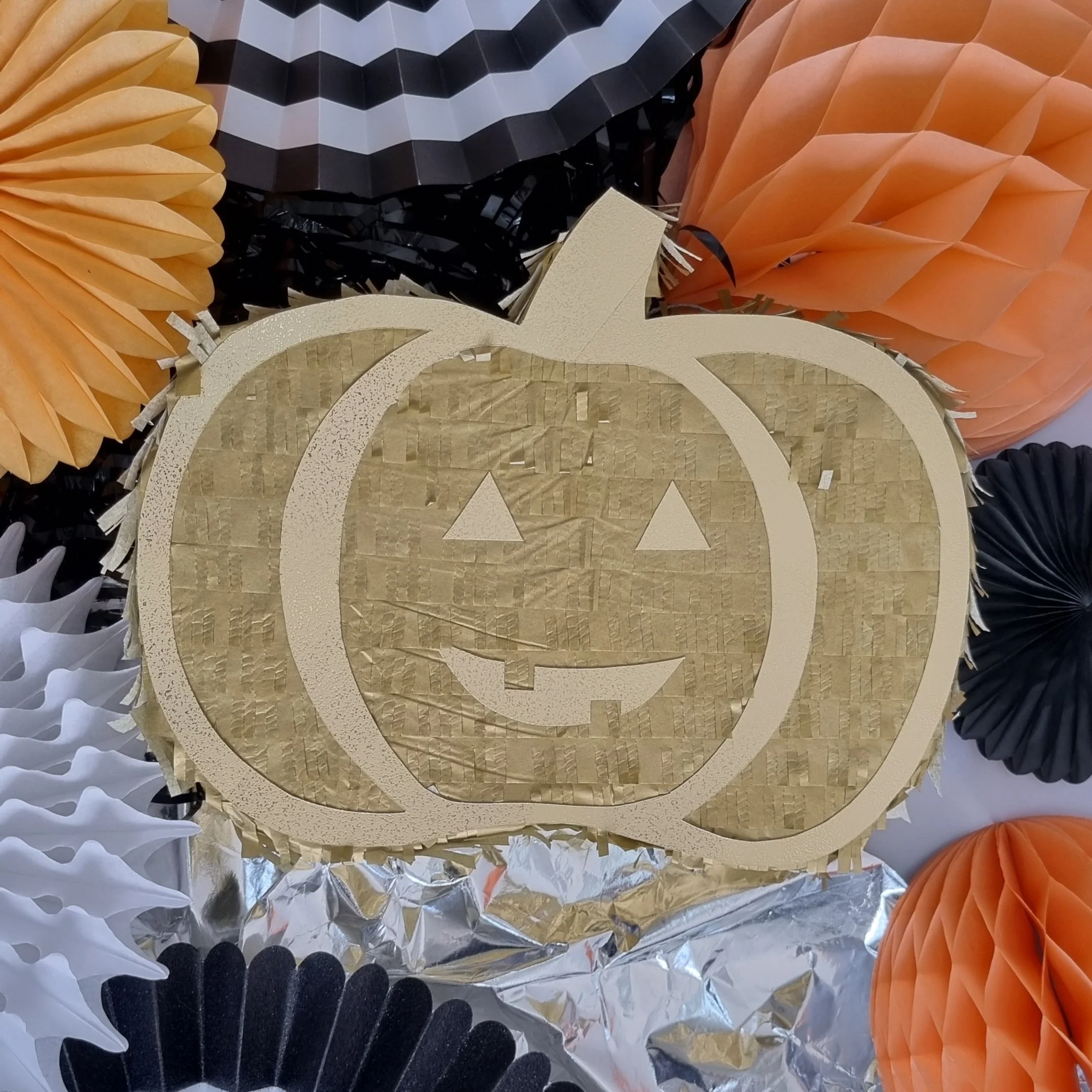 carved pumpkin gold pinata by pinyatay