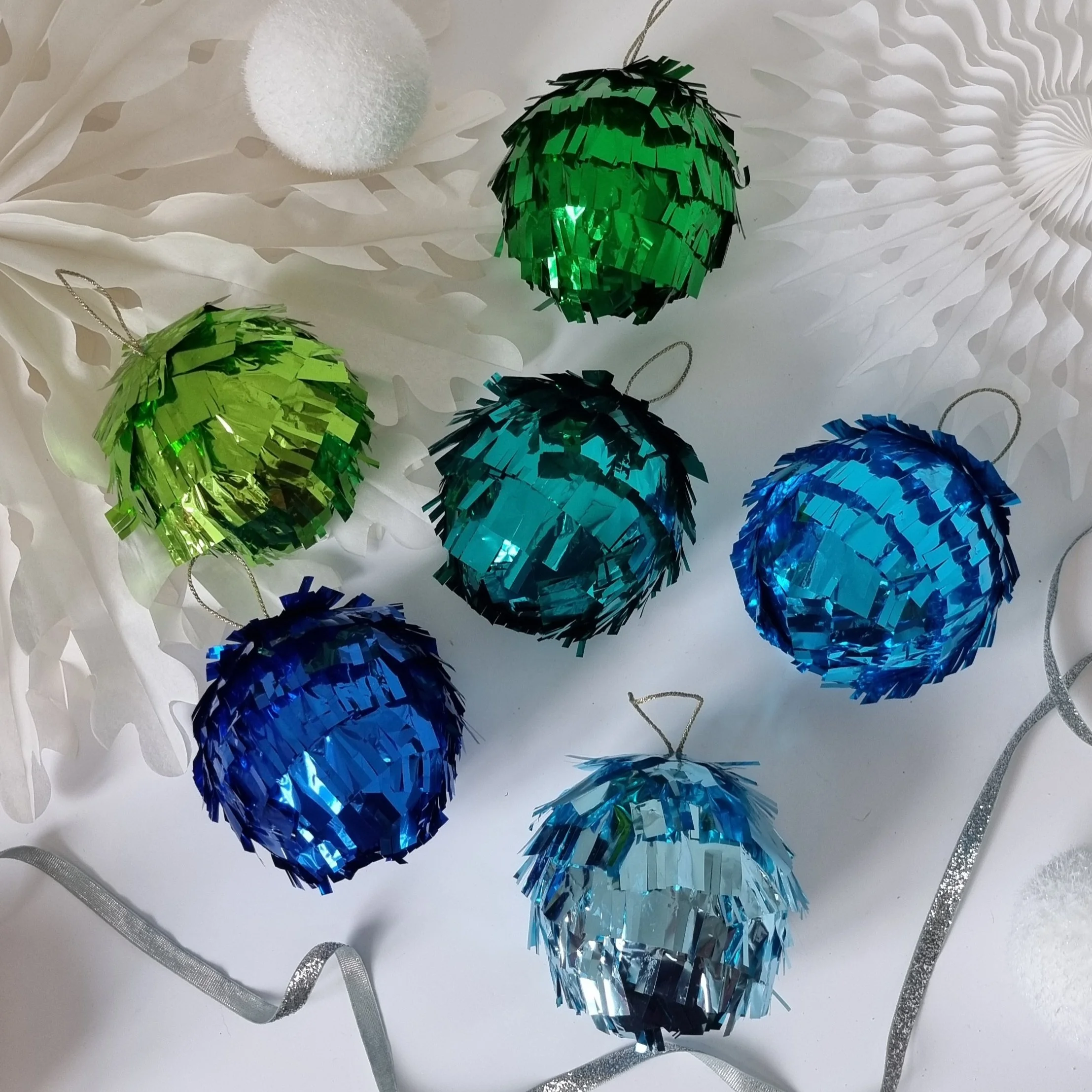 Blue and green metallic fringed baubles