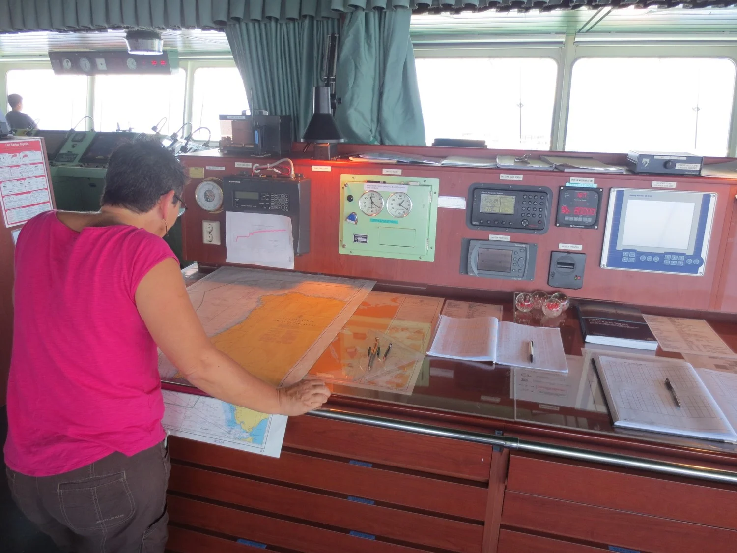 Looking at the navigation cards on the bridge