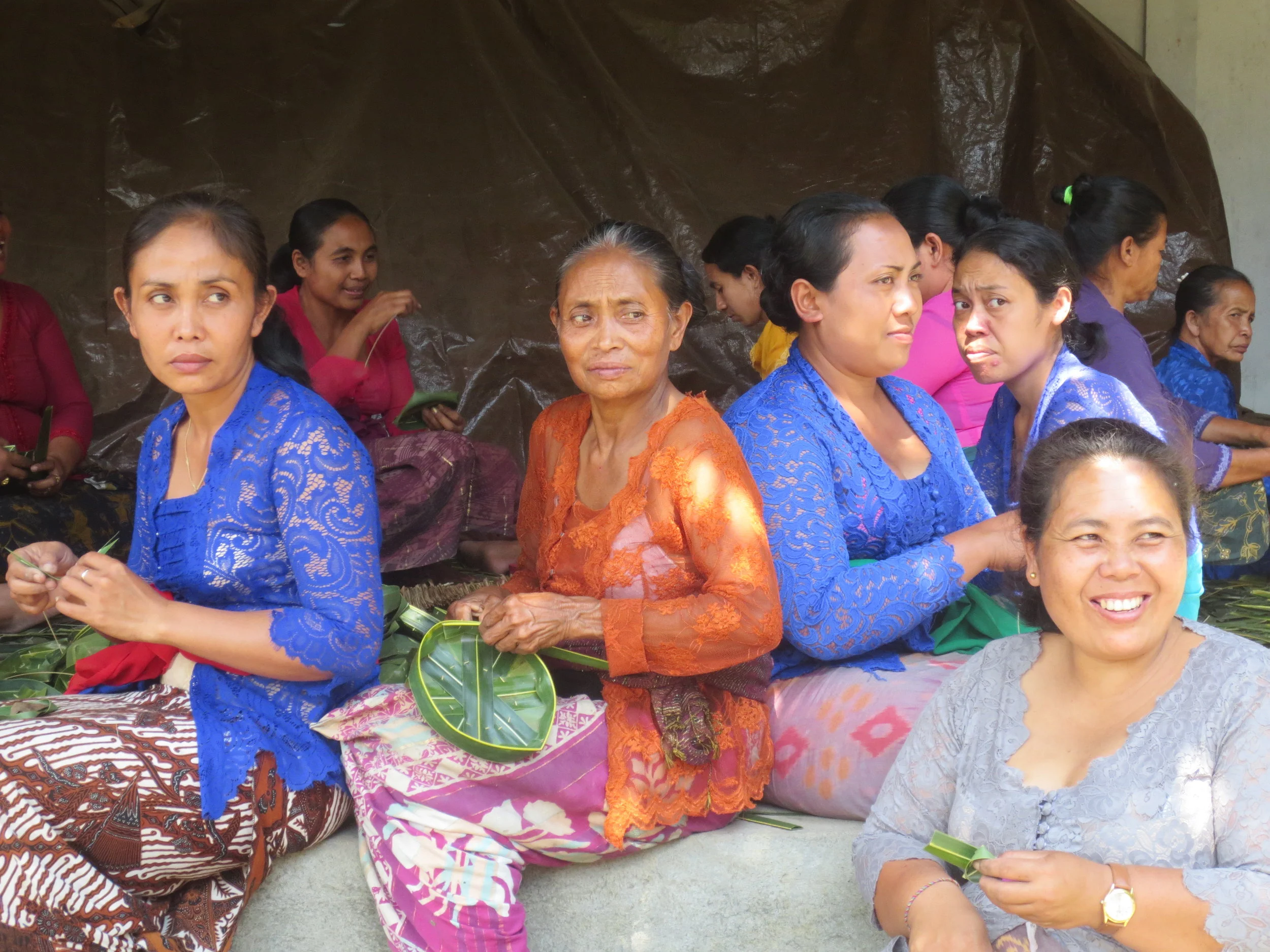 Women preparing offerings