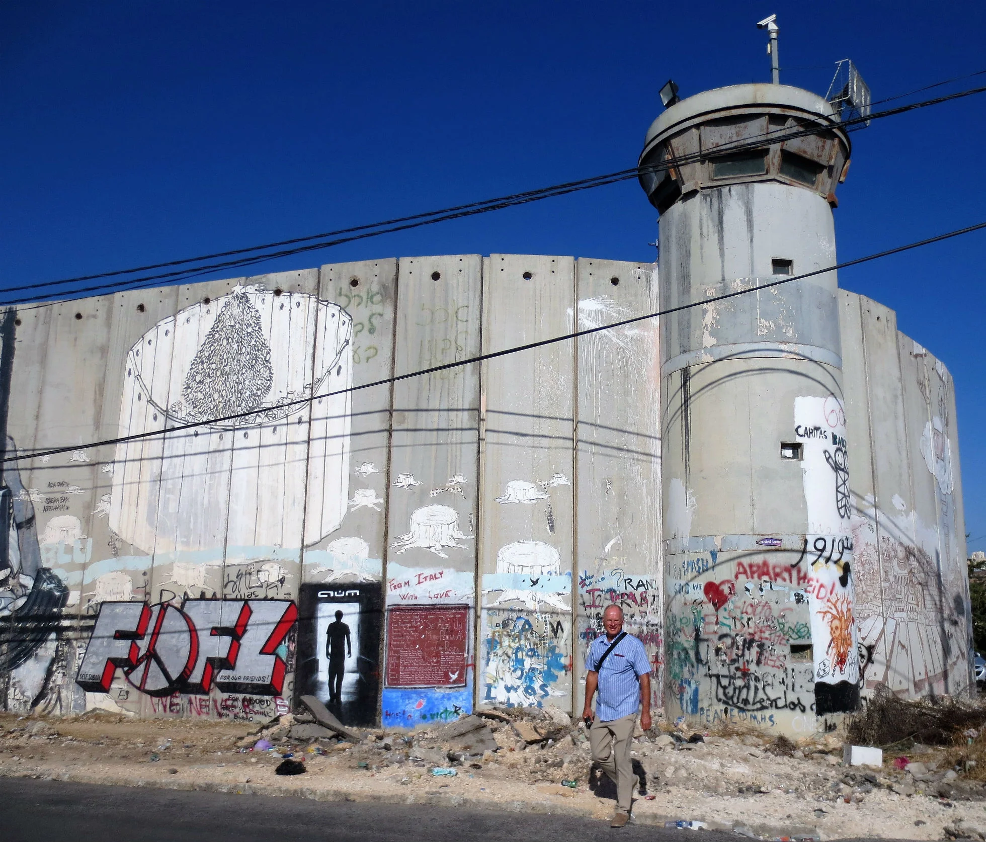 Security wall in Bethlehem. It separates the West Bank from Israel. Here it is eight meters high. It is called the separation barrier by the Palestinians and they put beautifull graffiti (Banksy) on.
