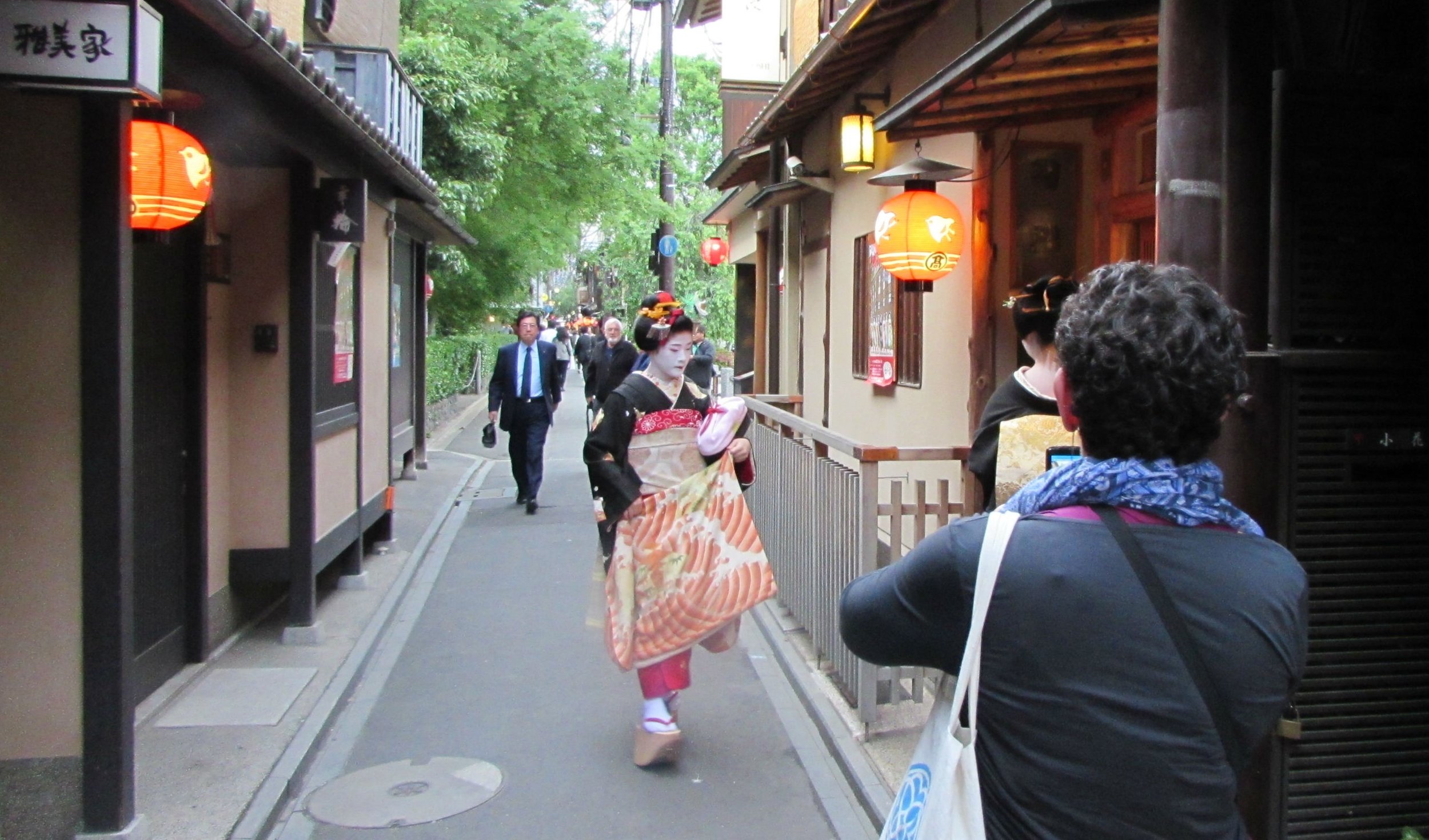 A Geisha in Gion walking to her work