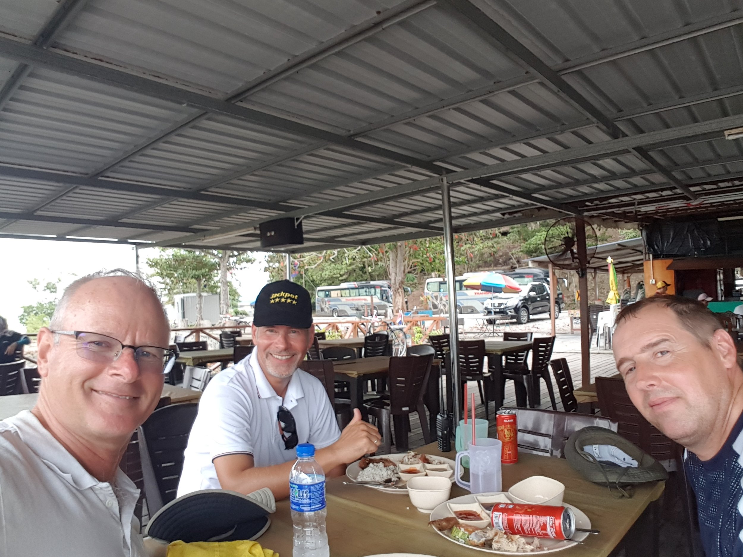 Elliott, Peter and Frank having rice lunch in Tangjung Pengelih