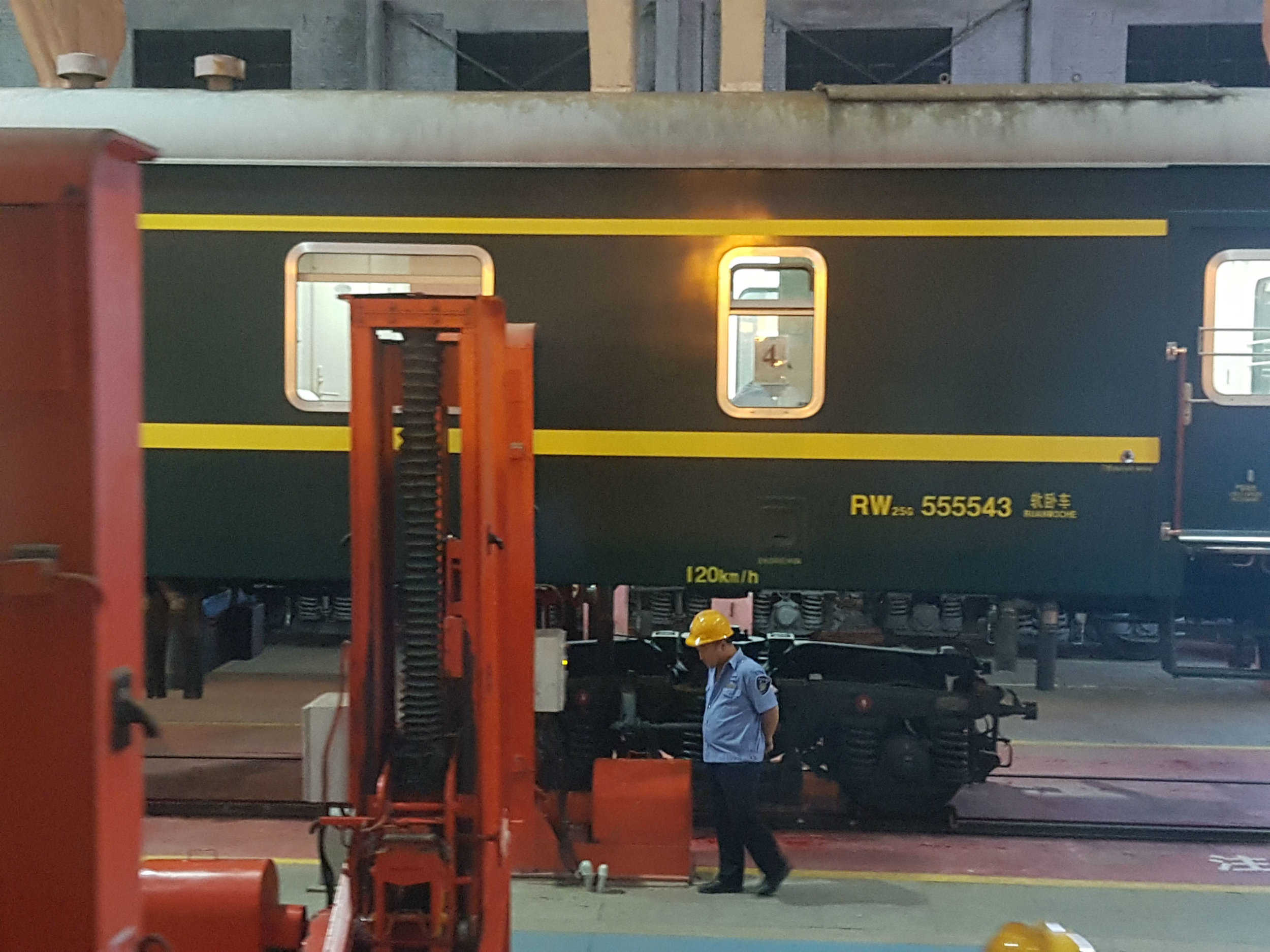Lifting the train carriage to change its wheels at the Chinese - Mongolian border