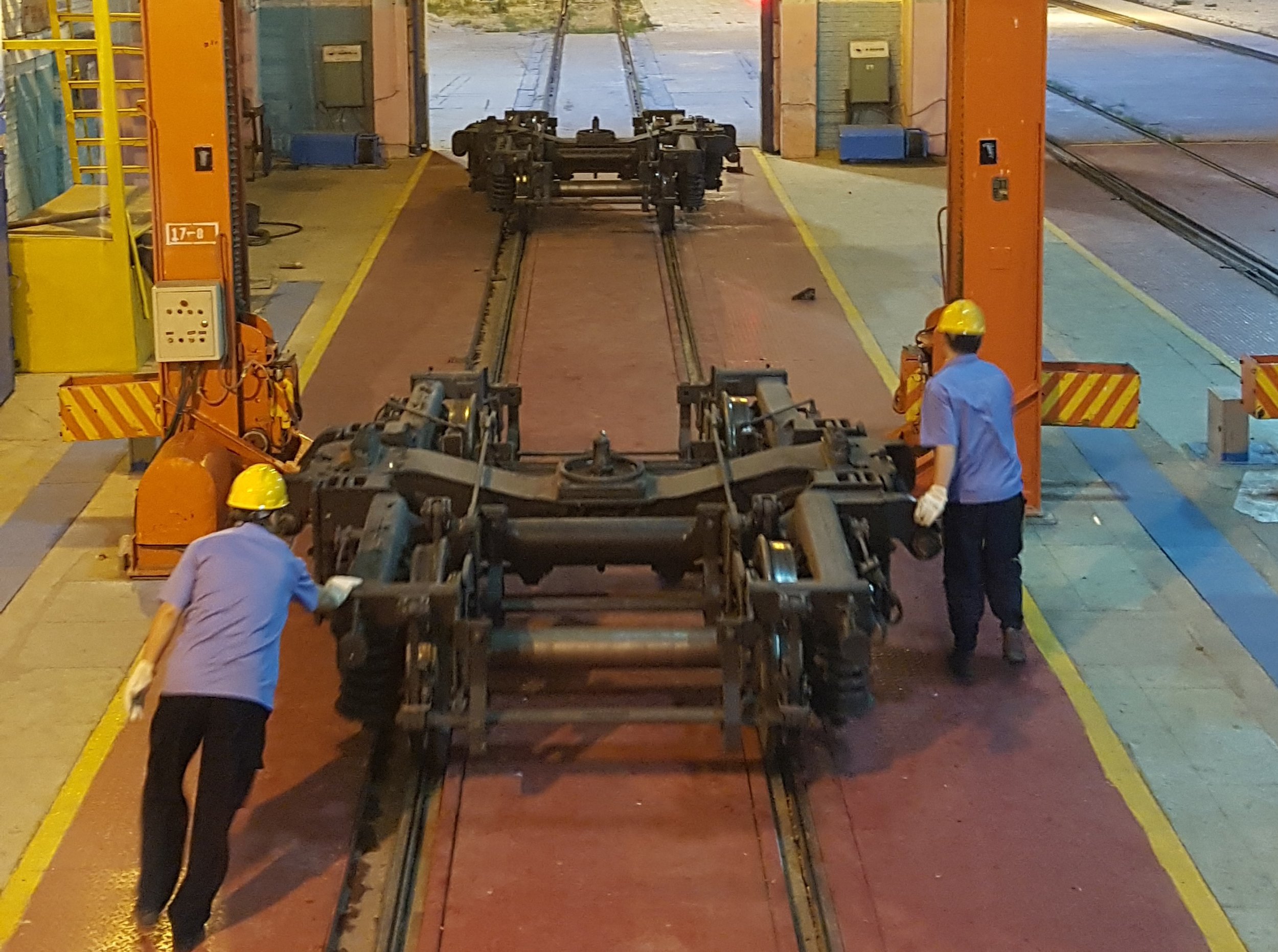 Changing the wheels underneath the train carriages