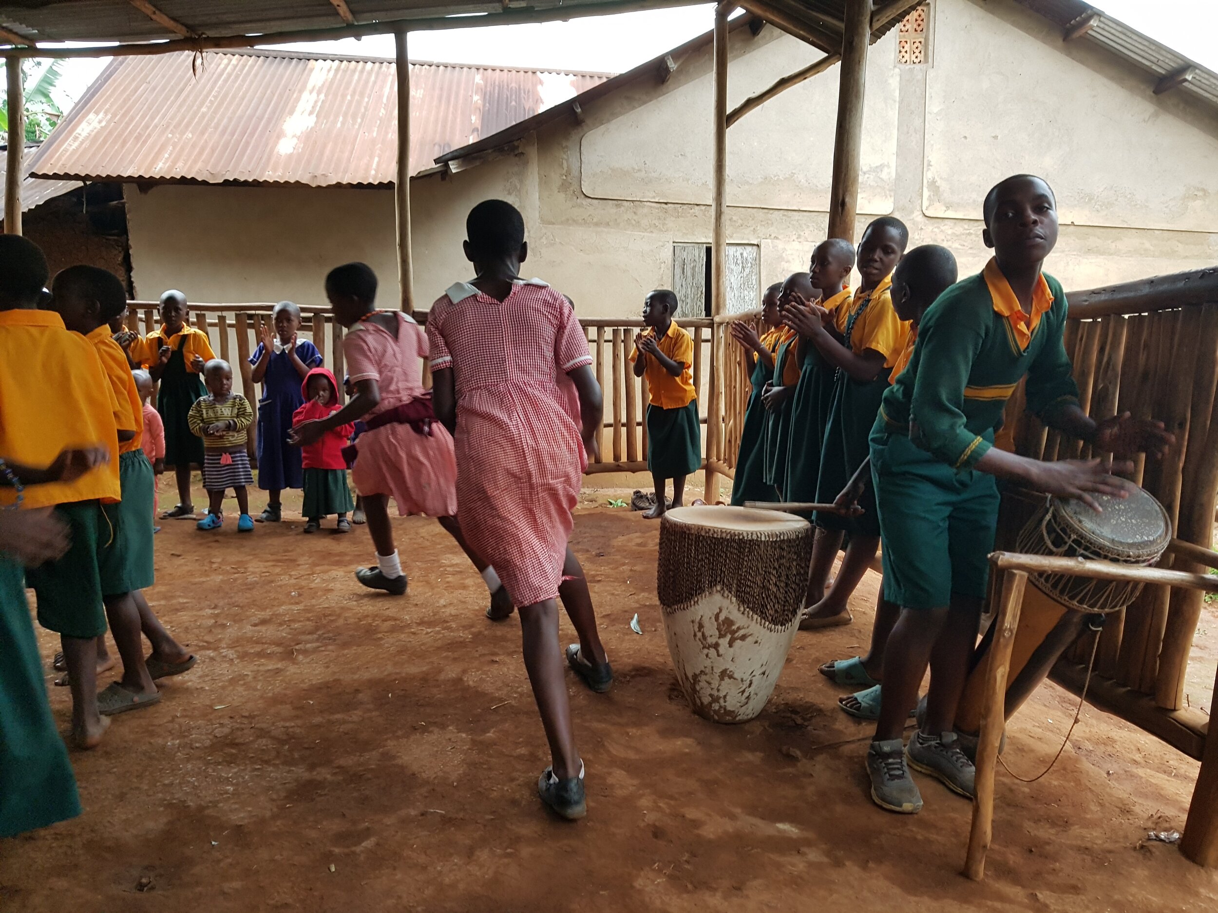 In Uganda children dancing. They called us 'Amazung' (white man)