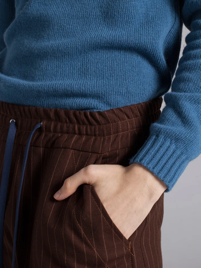 Turtleneck blue wool sweater for man cuff detail