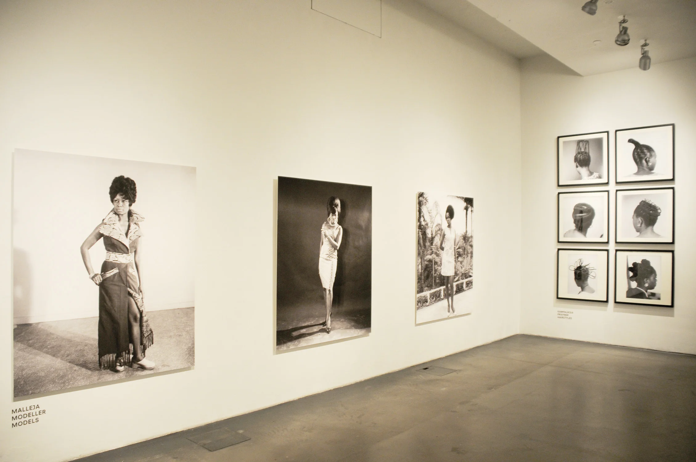 Installation view of .D Okhai Ojeikere: Moments of Beauty , at Museum of Contemporary Art, Kiasma, 2011. Above: Photo courtesy African Digital Art.