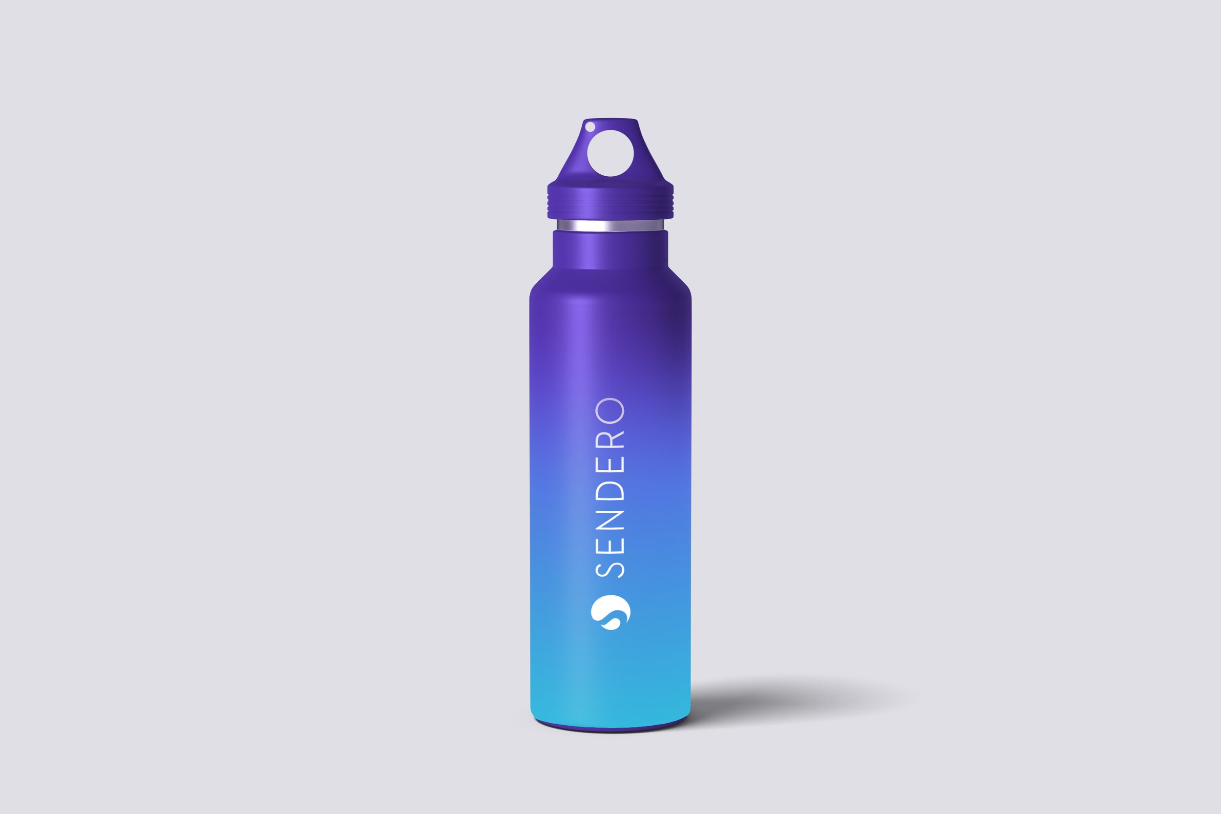 A purple and blue energy drink bottle with a screw-on cap, featuring the text 'SENDERO' on the label.