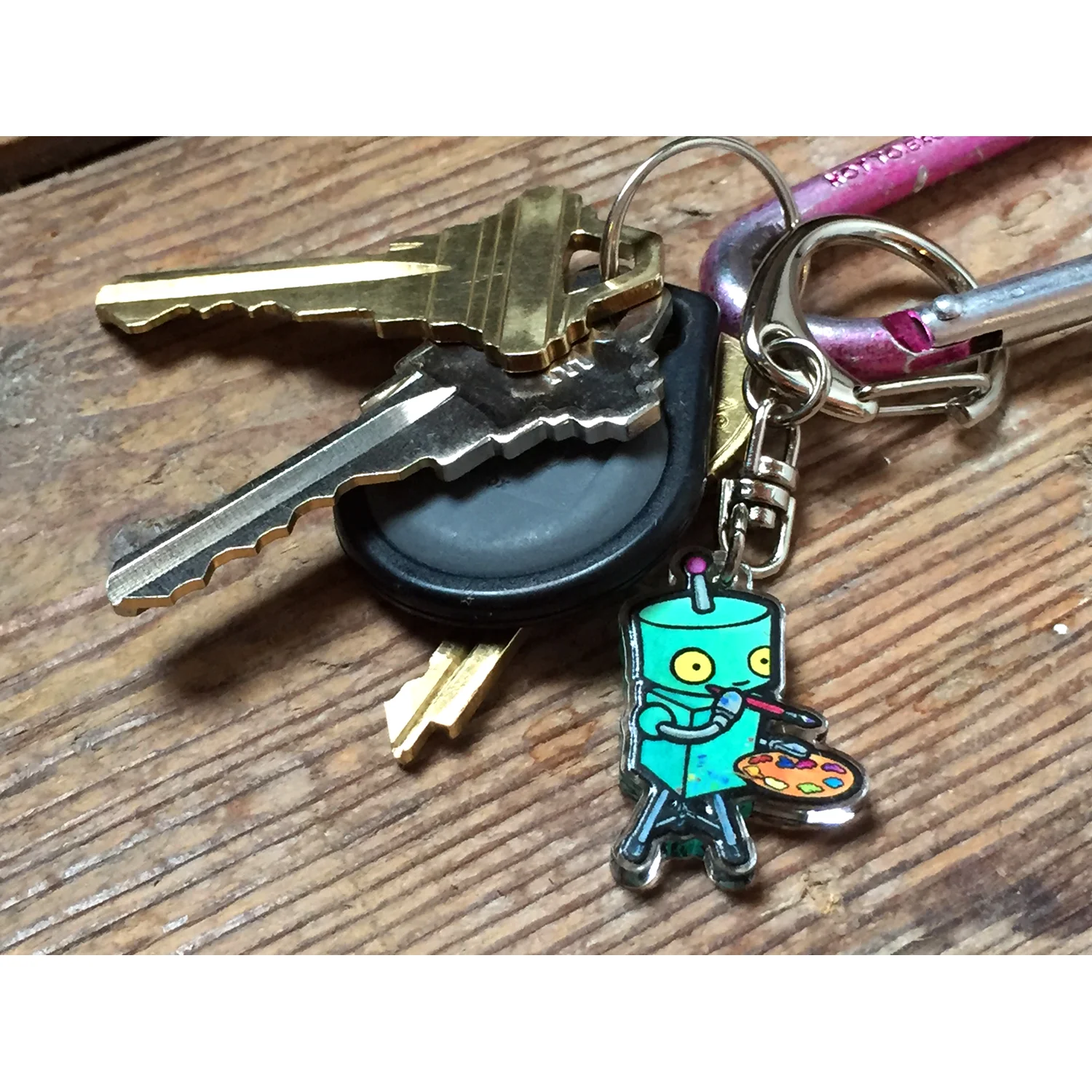 Artist Robot, teal, clear acrylic 1" keychain mini charm with si