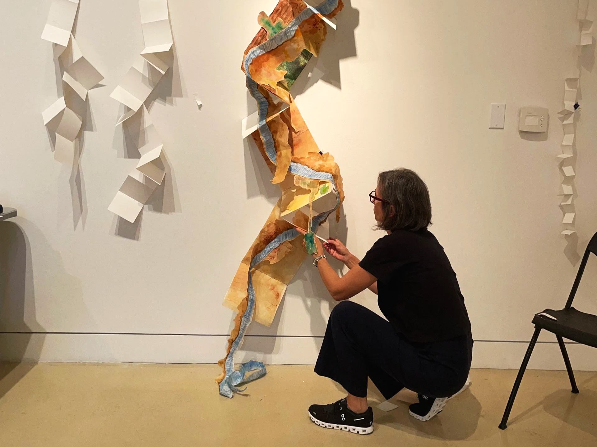 Artist Amanda Mears creates a Leaving Earth Project sculptural book at Torrance Art Museum, CA