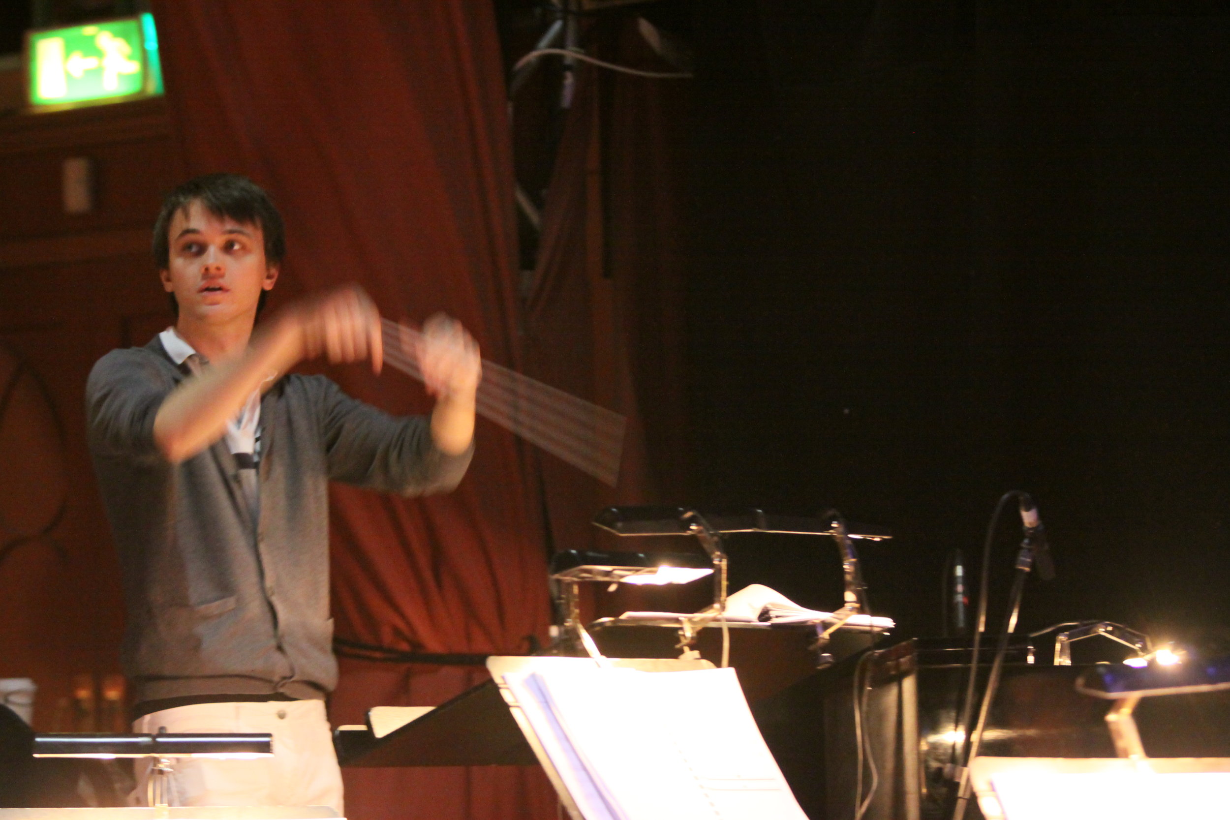 Jude conducting Forbidden Fruit, Brighton Festival, Brighton Dome, composed by Jude Obermüller (photo by Sarah Sutherland-Rowe)