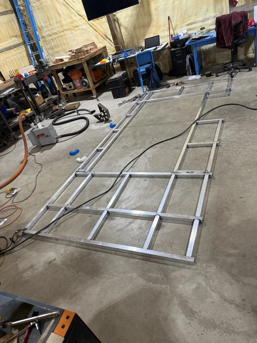 BrightDrop EV600 interior framework and structural reinforcement for vendor window installation