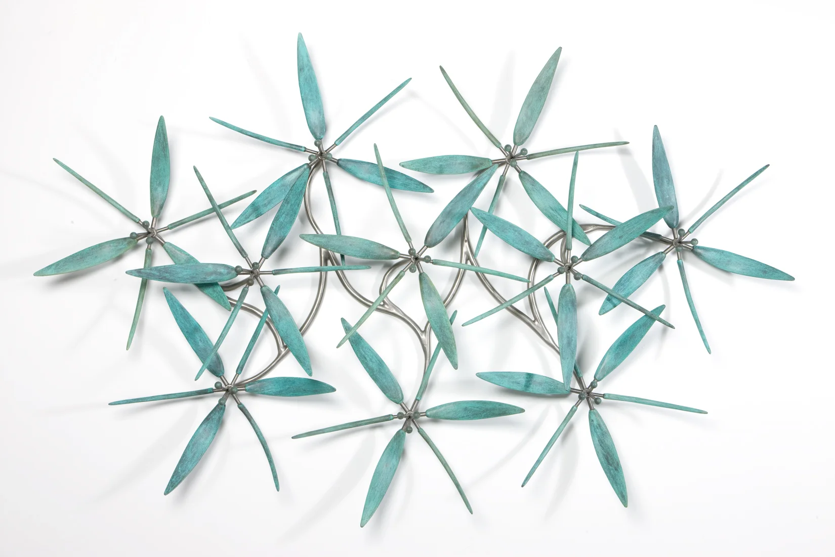 Ten Bronze Flowers , 2008 Bronze and stainless steel 69" x 103" x 15" Private Collection